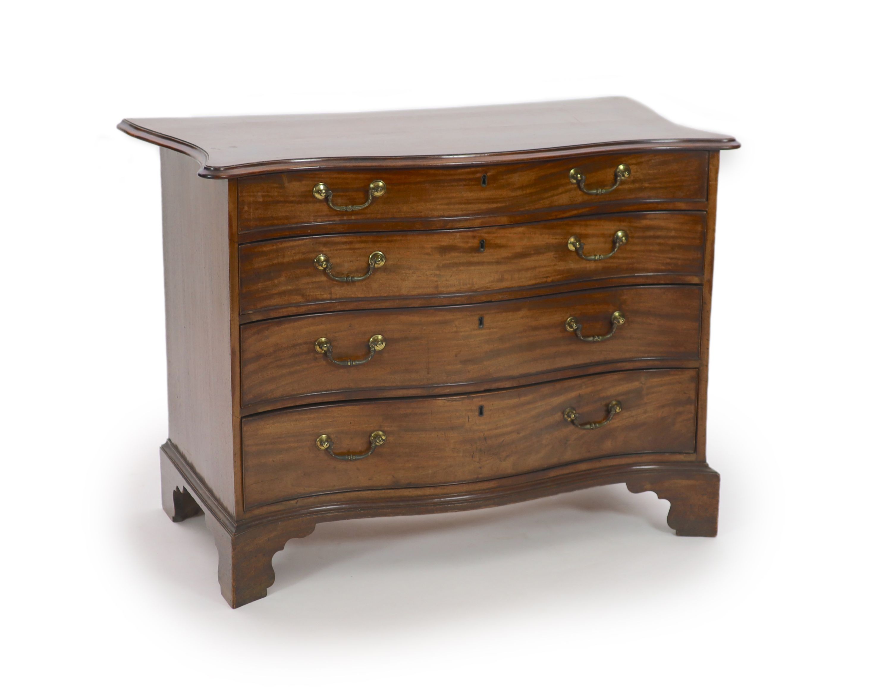 A George III serpentine mahogany chest, W.111cm D.55cm H.81cm